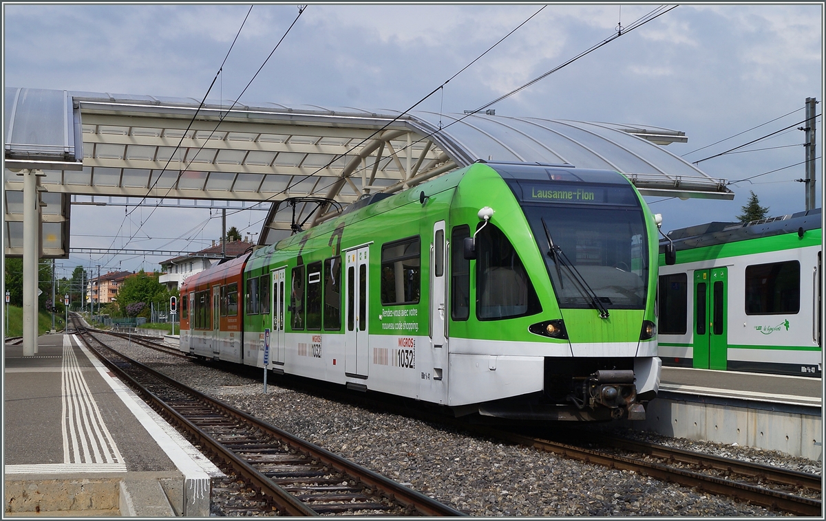 Der LEB RBe 4/8 41 beim Halt in Cheseaux. 
25. April 2014