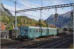 Mit dem BLS Steuerwagen BDt 957 (50 85 35 957-0 CH-BLS) an der Spite verlässt ein Auto-Tunnelzug den Bahnhof Kandersteg auf dem Weg zum Lötschbergtunnel mit dem Ziel Goppenstein.