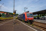 Die an die SBB Cargo International AG vermietete SBB Cargo Re 482 022-1 (91 85 4482 022-1 CH-SBBC) der SBB Cargo fährt am 18 Juni 2025 mit einem Kesselwagenzug durch Betzdorf/Sieg in Richtung